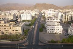 Muscat 01 07 Ruwi Early Morning View From Sheraton Room A few kilometres inland from Muscat and Mutrah is Ruwi, the capital's modern commercial district. Ruwi is surrounded by rocky mountains and has beautiful scenery. Here is a daytime view of Ruwi from our Sheraton room window.